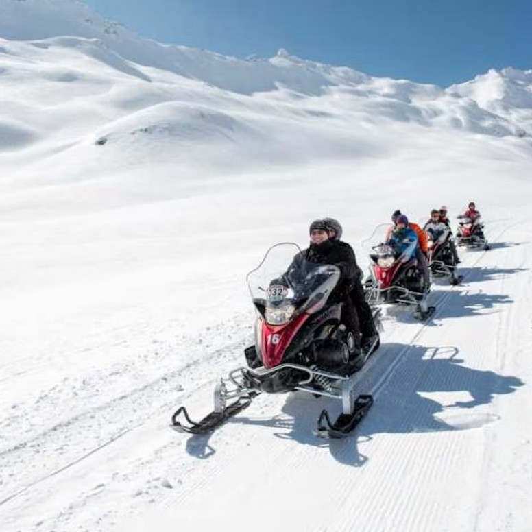 Snowmobiling over the Splugen Pass from Madesimo