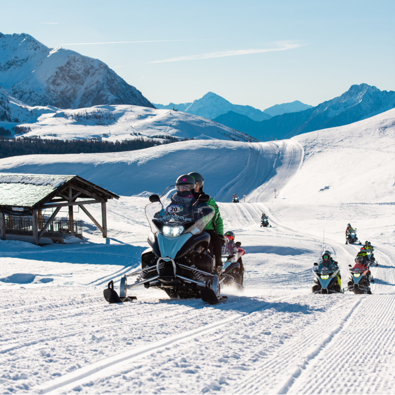 The Grand Tour from Madesimo by snowmobile