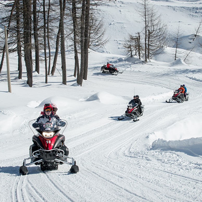 Snowmobiling on the Grand Tour from Madesimo