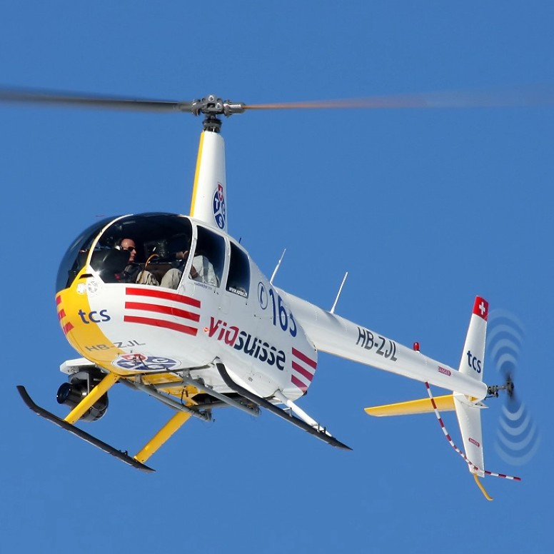 ROBINSON RH44 from Bern-Belp for a helicopter flight in the Jura with fondue