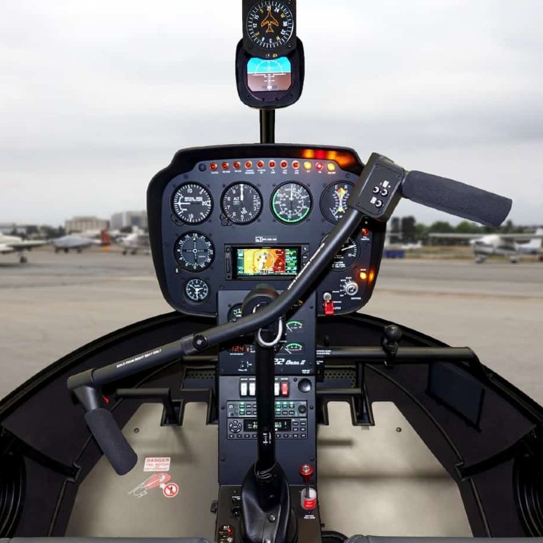 Robinson RH22 cockpit for an introduction to flying from Bern-Belp